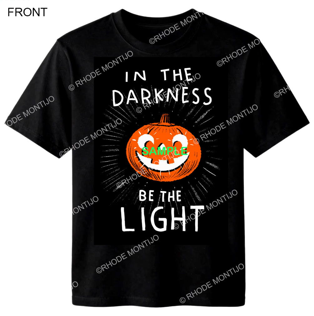 SDCC 2026 New T-Shirt: IN THE DARKNESS BE THE LIGHT